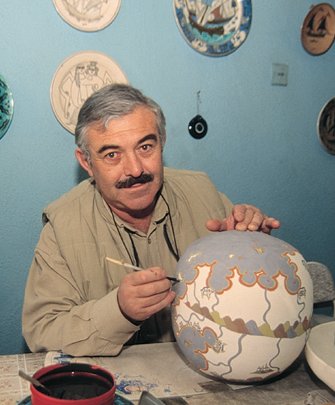 Sıtkı OLÇAR sanatçı portresi
